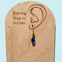Handmade glass earrings. Blue and green glass with bronze trim. Sterling silver ear wires.