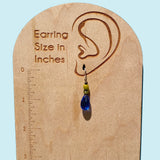 Handmade glass earrings. Blue and green glass with bronze trim. Sterling silver ear wires.