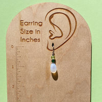 Frosted white glass earrings. Handmade in the USA using German and Czech glass.