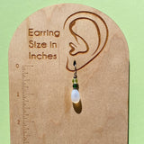 Frosted white glass earrings. Handmade in the USA using German and Czech glass.