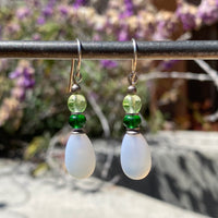 Frosted white glass earrings. Handmade in the USA using German and Czech glass.