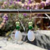 Frosted white glass earrings. Handmade in the USA using German and Czech glass.