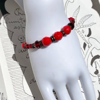 Red beaded bracelet. Glass, crystal and bronze. Handmade in the USA.