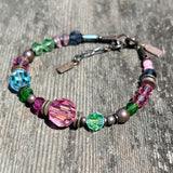 Beaded bracelet on wood.