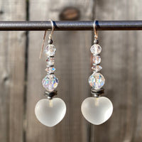 Frosted white heart earrings.