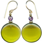 Bright olive green glass earrings. Top beads are amethyst Austrian crystal. Ear wires are 14 karat gold-filled. All handwork done in the USA.