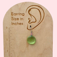 Peridot glass drop earrings with pink Austrian crystal top beads.