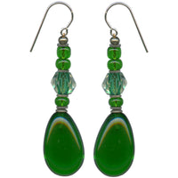 Emerald green glass drop earrings with antique Japanese focal beads. Antiqued silver overlay metal trim with sterling silver ear wires. All handwork done in the USA.