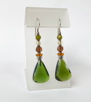 Green glass earrings with topaz, smoke topaz, yellow and olivine green accents. Austrian crystal, German glass, Czech glass. Sterling silver ear wires. Handmade in the USA.