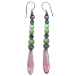 Pink chandelier earrings. German and Czech glass with Austrian crystal in shade of amethyst and peridot. Antiqued bronze accents, sterling silver ear wires. All handwork done in the USA.