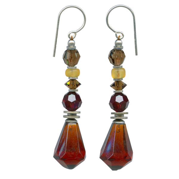 Shades of topaz and dark amber glass and crystal drop earrings. Sterling silver ear wires. Handmade in the USA.