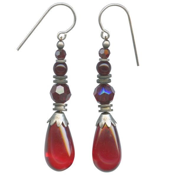 Red glass earrings. German glass with Austrian crystal and Czech glass accents. Metal trim is antiqued silver plate, with sterling silver ear wires. All handwork done in the USA.