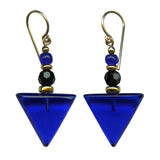A pair of cobalt blue glass drop earrings with jet black accents, featuring gold-filled ear wires and beads.
