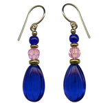 Cobalt glass drops with light pink Austrian crystal focal beads. Top beads are cobalt Czechoslovakian glass. Metal trim is 14 karat gold overlay. Ear wires are 14 karat gold filled. All handwork done in the USA.
