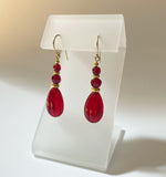 Red glass and crystal earrings with gold accents. Handmade in the USA.