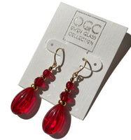Red glass and crystal earrings with gold accents. Handmade in the USA.