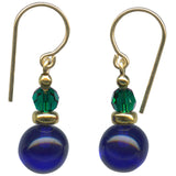 Cobalt glass drop earrings with emerald Austrian crystal top beads. Ear wires are 14 karat gold filled. All handwork done in the USA.
