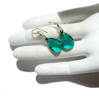 Teal green glass drop earrings with aquamarine Austrian crystal top beads. Gold accents. Handmade in the USA.