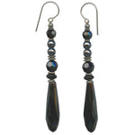 Jet chandelier earrings. Jet black prisms with jet Austrian crystal focal beads and glass hematite accents. Trim is antiqued silver -plate with sterling silver ear wires. All handwork done in the USA.