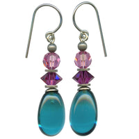 Teal glass drop earrings. Accents in pink and fuchsia are Austrian crystal. Metal trim is antiqued silver plate with sterling silver ear wires. All handwork done in the USA.