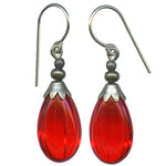Red German glass drop earrings. Sterling silver ear wires. All hand work done in the USA.