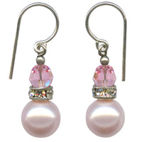 Pink pearl coated crystal drop earrings. Rhinestone accents and light pink Austrian crystal top beads. Sterling silver ear wires. All handwork done in the USA.