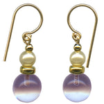 Light amethyst glass drop earrings with glass pearl top beads. Trim and ear wires are 14 karat gold filled. All handwork done in the USA.