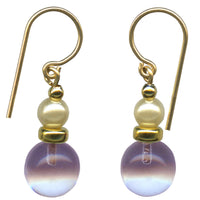 Light amethyst glass drop earrings with glass pearl top beads. Trim and ear wires are 14 karat gold filled. All handwork done in the USA.