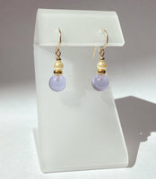 Light amethyst glass drop earrings with glass pearl top beads. 14 karat gold filled ear wires. All handwork done in the USA.