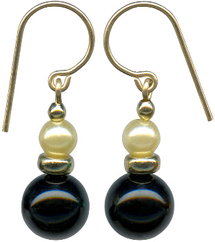 Jet glass drop earrings with pearl coated glass top beads. Metal trim is gold overlay with 14 karat gold filled ear wires. All handwork done in the USA.