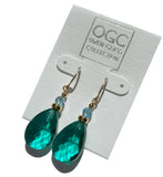 Teal green glass drop earrings with aquamarine Austrian crystal top beads. Gold accents. Handmade in the USA.