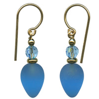 Frosted turquoise glass earrings. Aquamarine Austrian crystal top beads. Trim is gold overlay with gold filled ear wires. All handwork done in the USA.