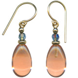 Pale peach glass drop earrings with indigo Austrian crystal top beads. Gold trim. All handwork done in the USA.