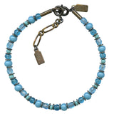 Turquoise beaded bronze bracelet from Owen Glass Collection featuring bright blue beads and silver accents.