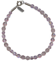 Austrian crystal and Czech glass beaded bracelet in shades of light amethyst. Metal trim is antiqued silver plate, from our own tooling. 7 inch bracelet with a 1 inch extender included. All handwork done in the USA.