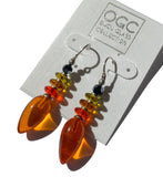 Bright orange glass drop earrings with Czech glass accents. Hematite Austrian crystal top beads. Sterling silver ear wires. Handmade in the USA.